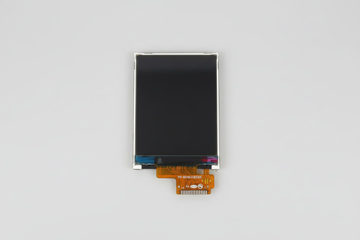 Small electronic display screen on a dark surface
